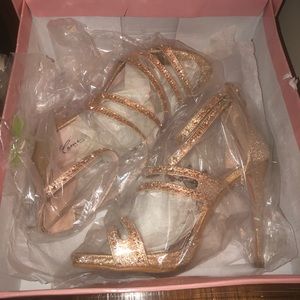Rose Gold colored shoes that were worn once.